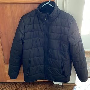 Boys’ Northface winter coat that is reversible. Size youth XL 18/20. Black.
